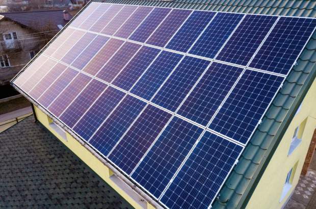 aerial-top-view-new-modern-residential-house-cottage-with-blue-shiny-solar-photo-voltaic-panels-system-roof-renewable-ecological-green-energy-production-concept.jpg<br><i>© FotoEnergy fotowoltaika i pompy ciepła</i>